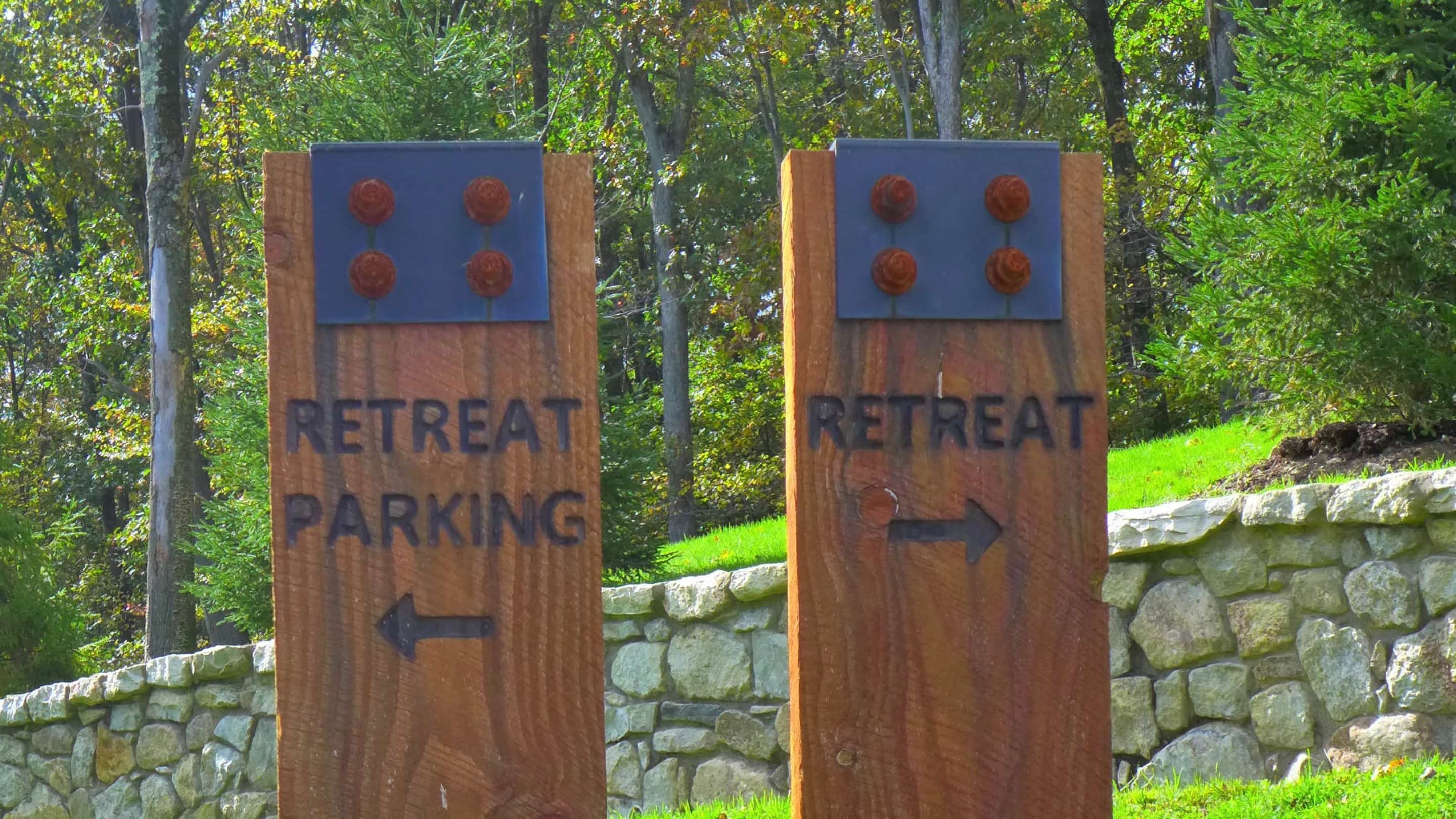 two signs: retreat and retreat parking